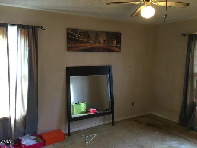 a living room with a fireplace