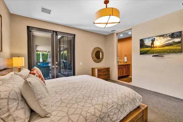 a view of an outdoor space with furniture and garden