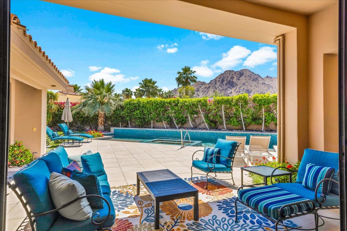 45730 Indian Canyon Road Indian Wells, CA 92210 - Photo 43 of 71 a outdoor living space with furniture and a potted plant