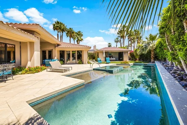 a bathroom with a double vanity sink mirror and double