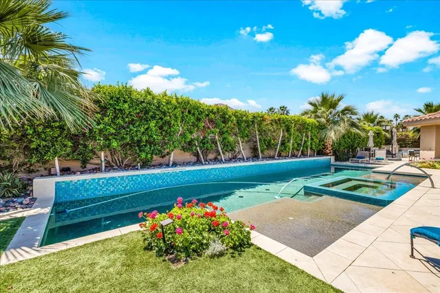 a view of a garden with potted plants