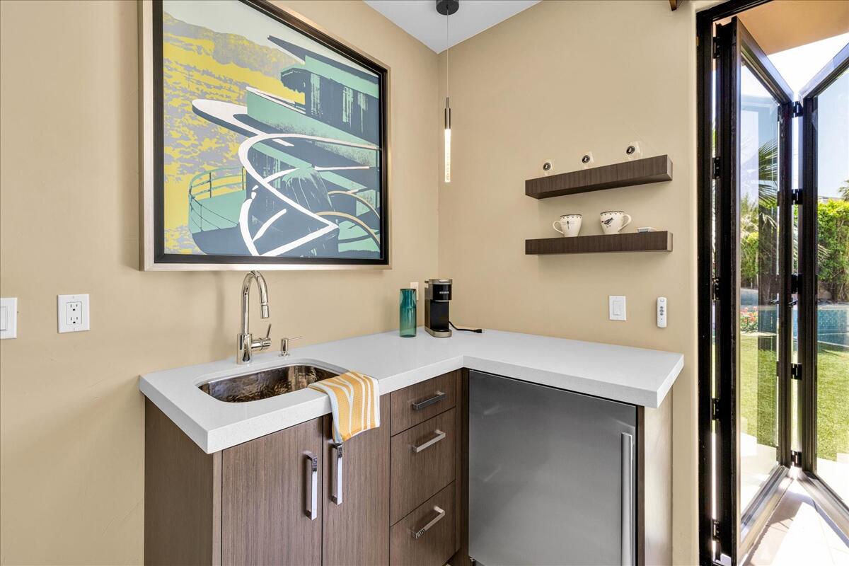 45730 Indian Canyon Road Indian Wells, CA 92210 - Photo 59 of 71 a utility room with dryer and washer