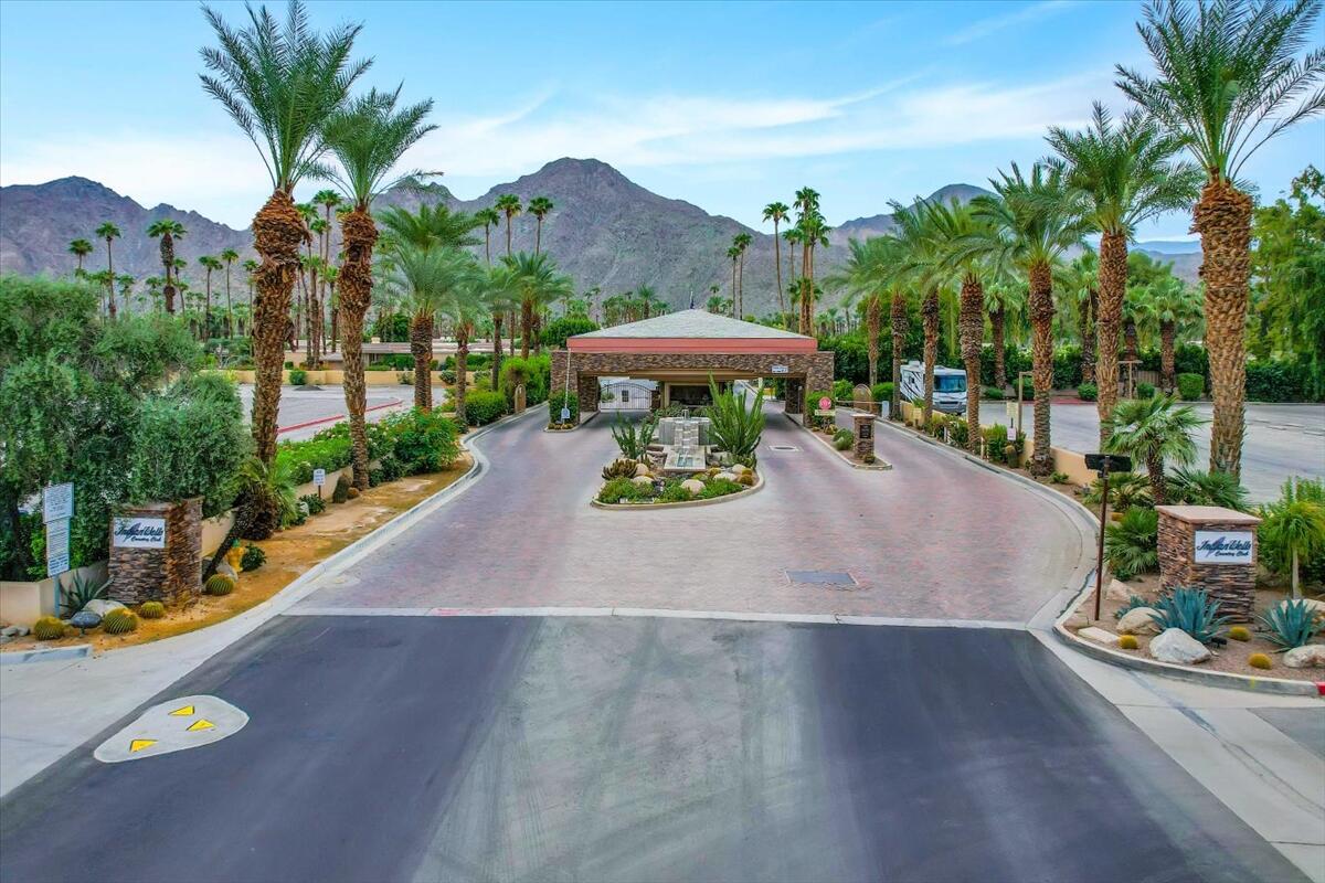 45730 Indian Canyon Road Indian Wells, CA 92210 - Photo 66 of 71 a view of a swimming pool with a patio