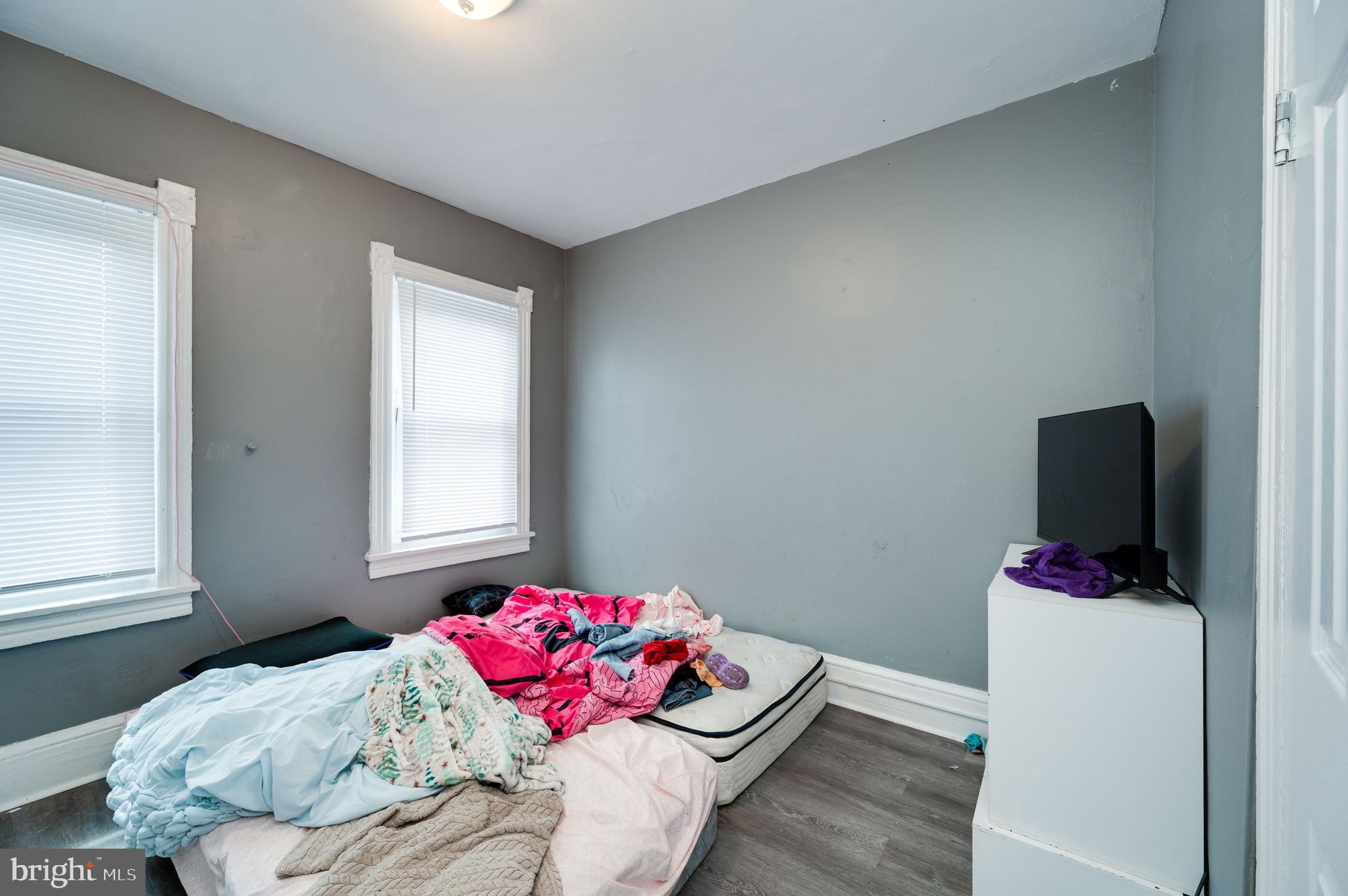 235 Hudson Street Reading, PA 19601 - Photo 12 of 25 a bedroom with a bed and a window