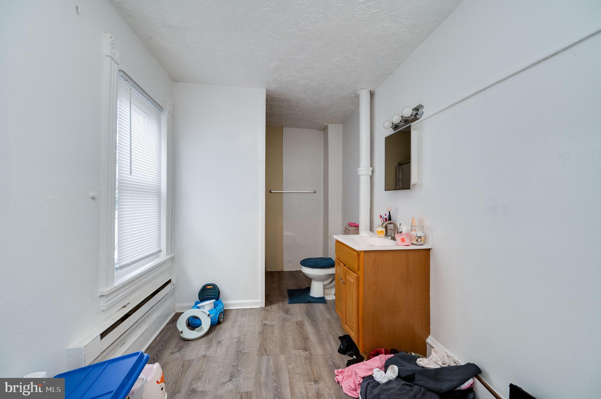 235 Hudson Street Reading, PA 19601 - Photo 17 of 25 a view of a workspace with furniture and a window
