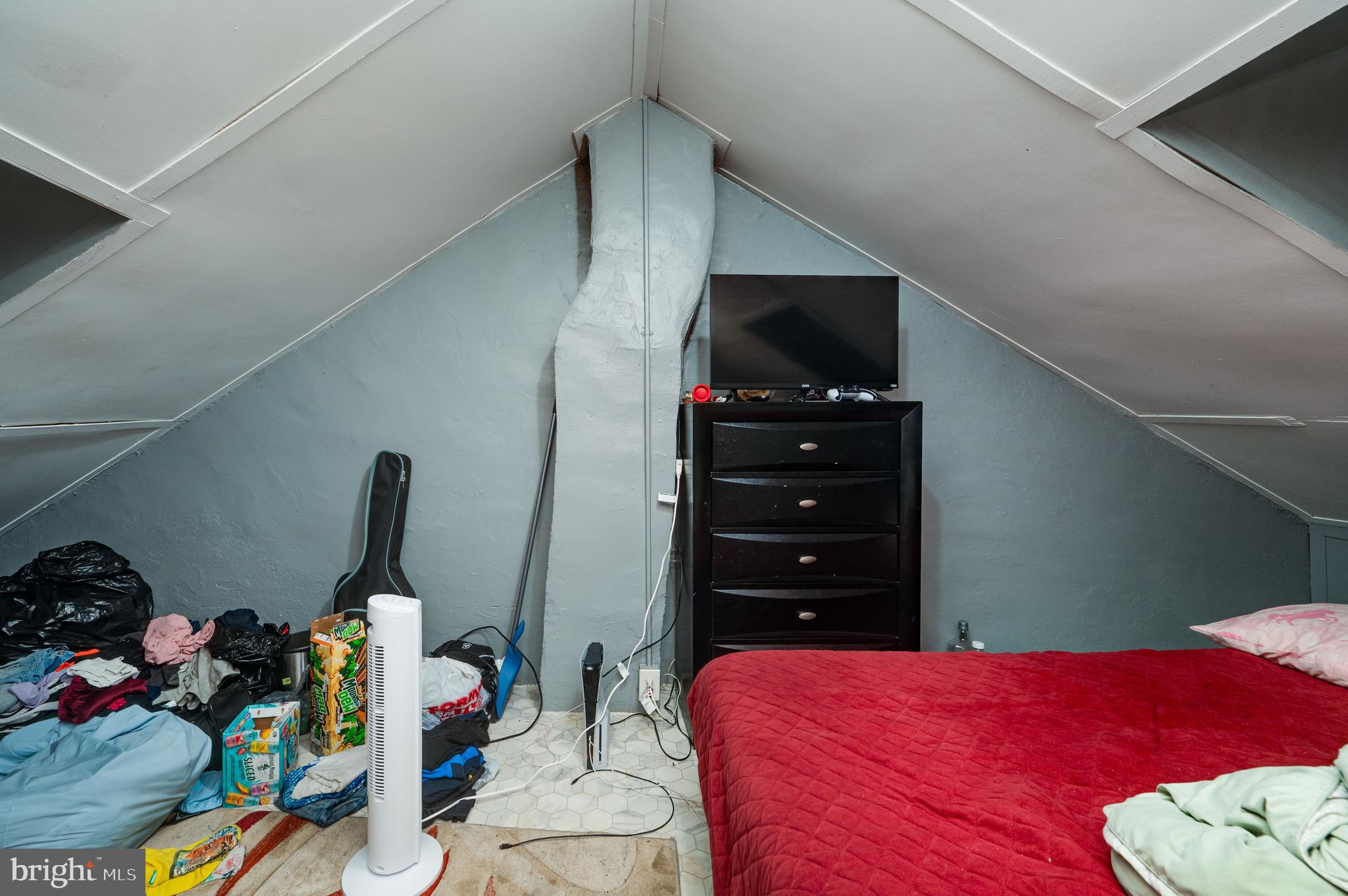 235 Hudson Street Reading, PA 19601 - Photo 20 of 25 a bedroom with a bed closet and a garden