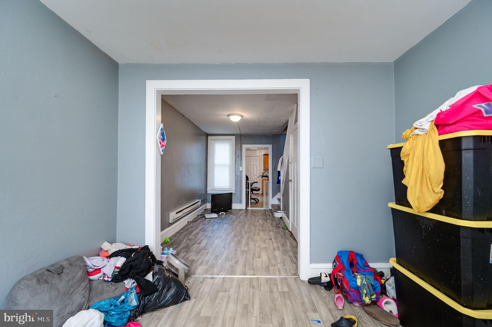 235 Hudson Street Reading, PA 19601 - Photo 3 of 25 a view of livingroom with furniture and wooden floor