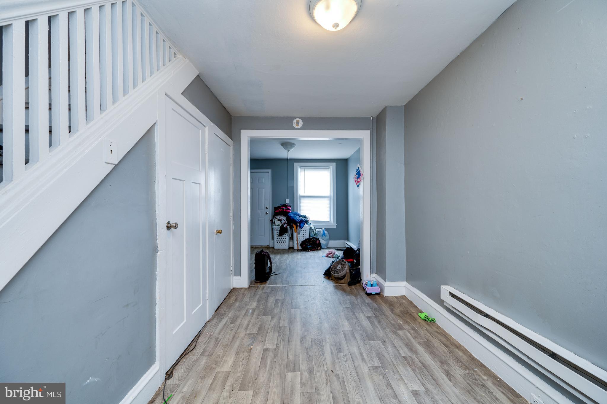 235 Hudson Street Reading, PA 19601 - Photo 6 of 25 a view of a room with wooden floor