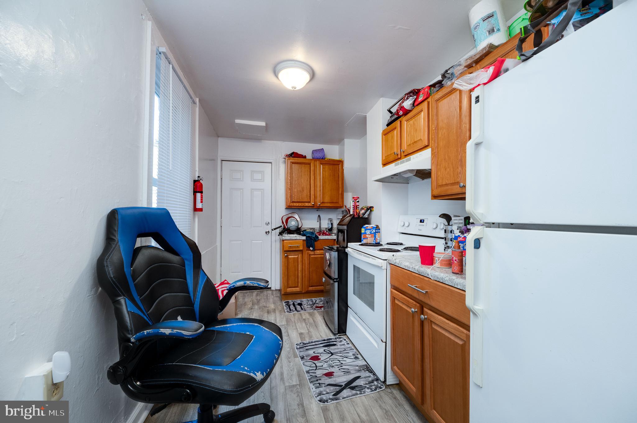 235 Hudson Street Reading, PA 19601 - Photo 7 of 25 a living room with furniture and a dining table