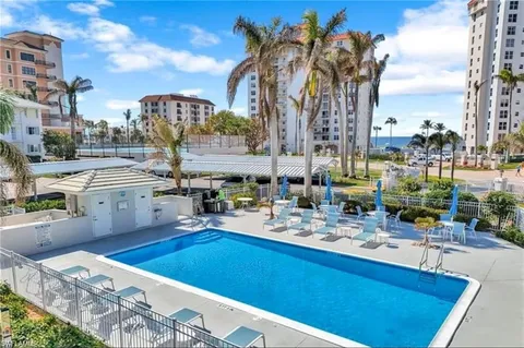 a view of storage and utility room with washer and dryer