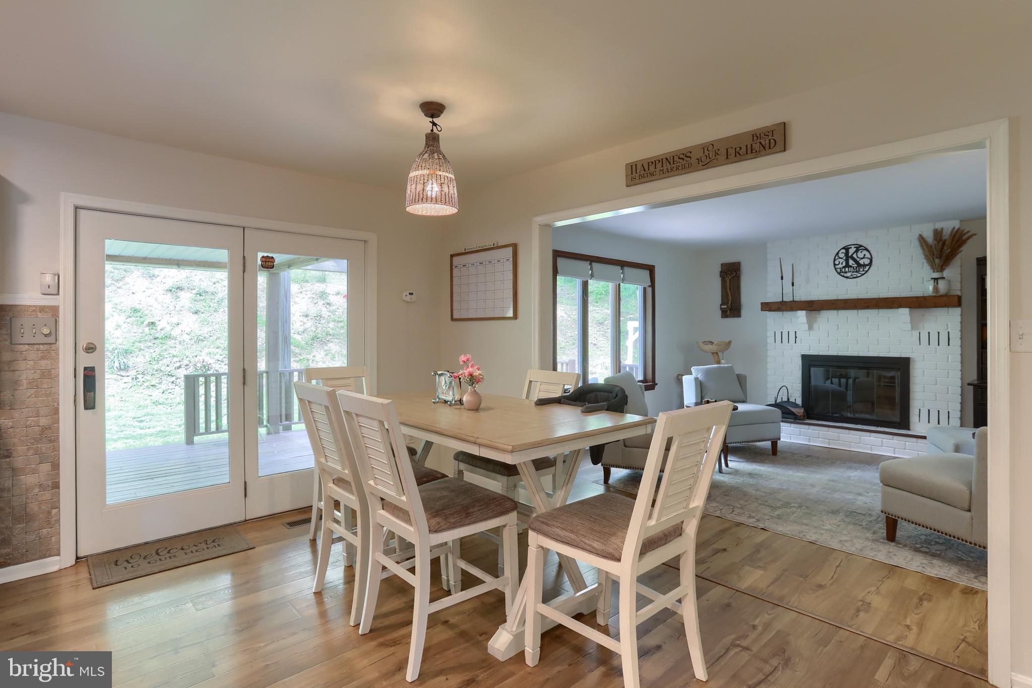 46 Gelsinger Road Reading, PA 19608 - Photo 12 of 50 a view of a dining room with furniture window and wooden floor
