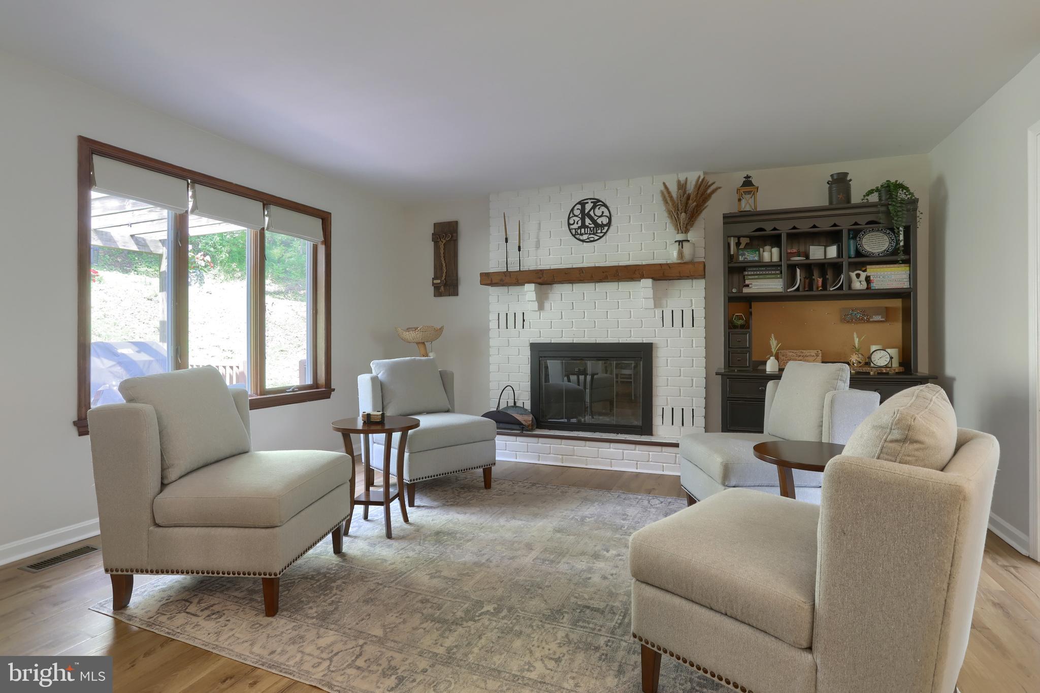 46 Gelsinger Road Reading, PA 19608 - Photo 14 of 50 a living room with furniture and a fireplace