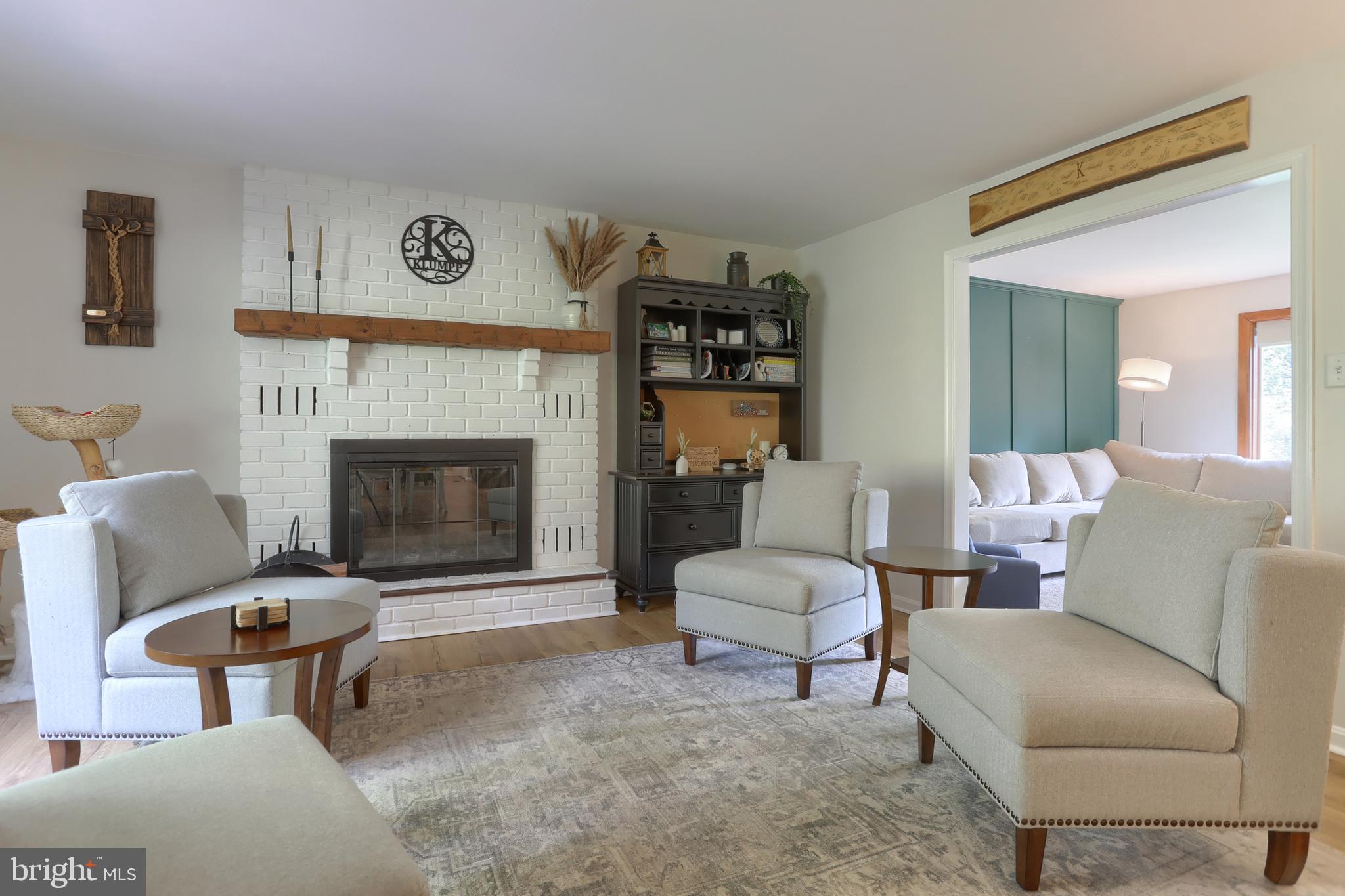 46 Gelsinger Road Reading, PA 19608 - Photo 15 of 50 a living room with furniture and a fireplace