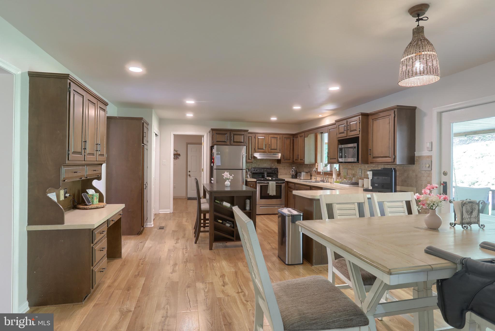 46 Gelsinger Road Reading, PA 19608 - Photo 16 of 50 a living room with lots of furniture and kitchen view