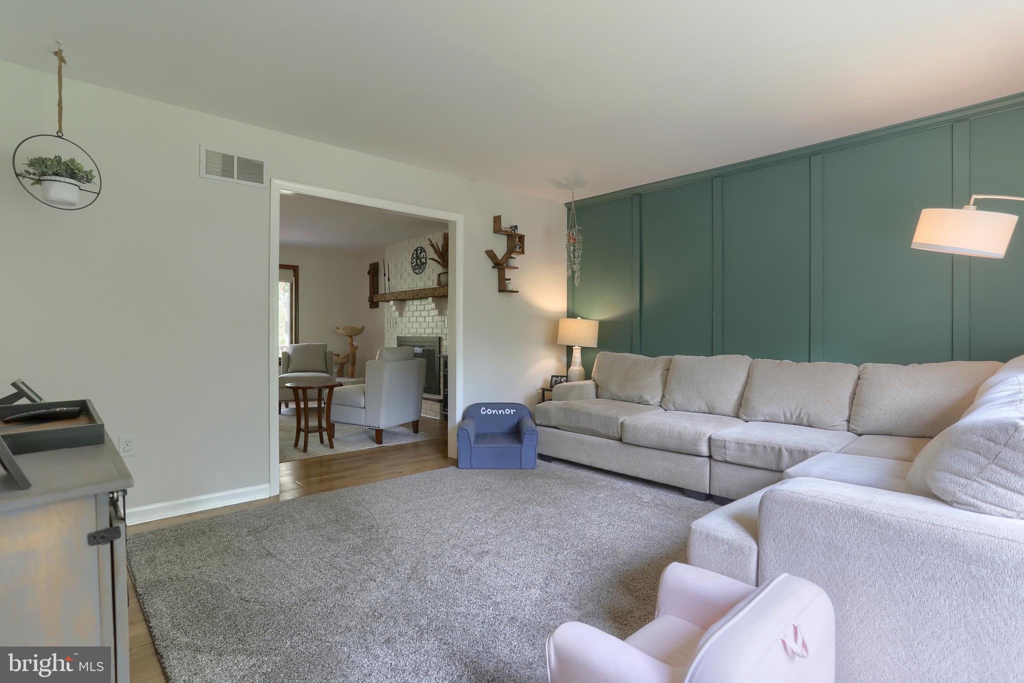 46 Gelsinger Road Reading, PA 19608 - Photo 19 of 50 a living room with furniture a rug and a window