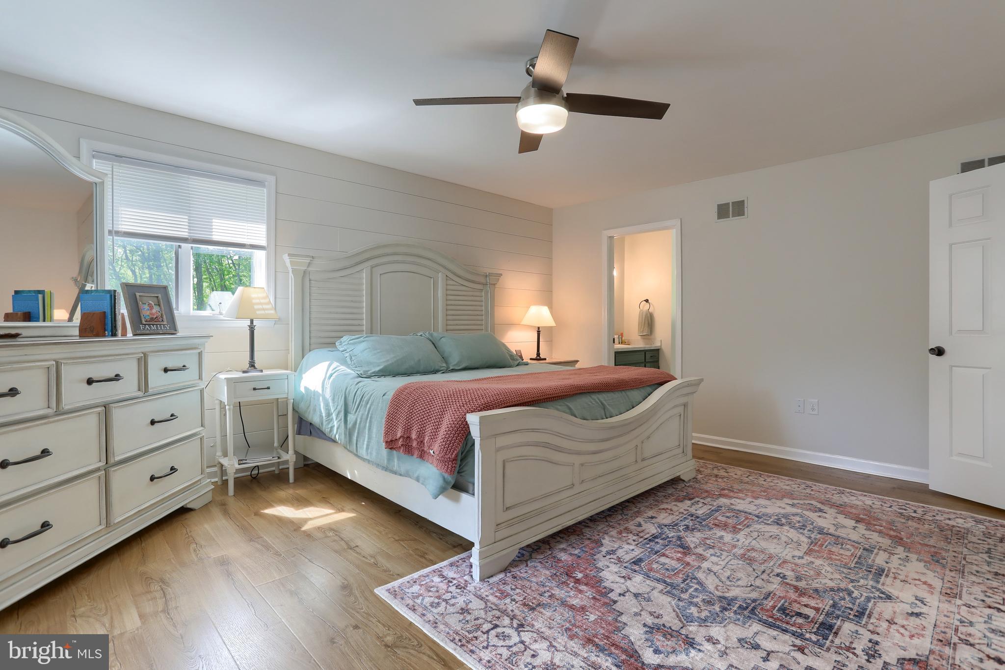 46 Gelsinger Road Reading, PA 19608 - Photo 28 of 50 a spacious bedroom with a bed and a dresser