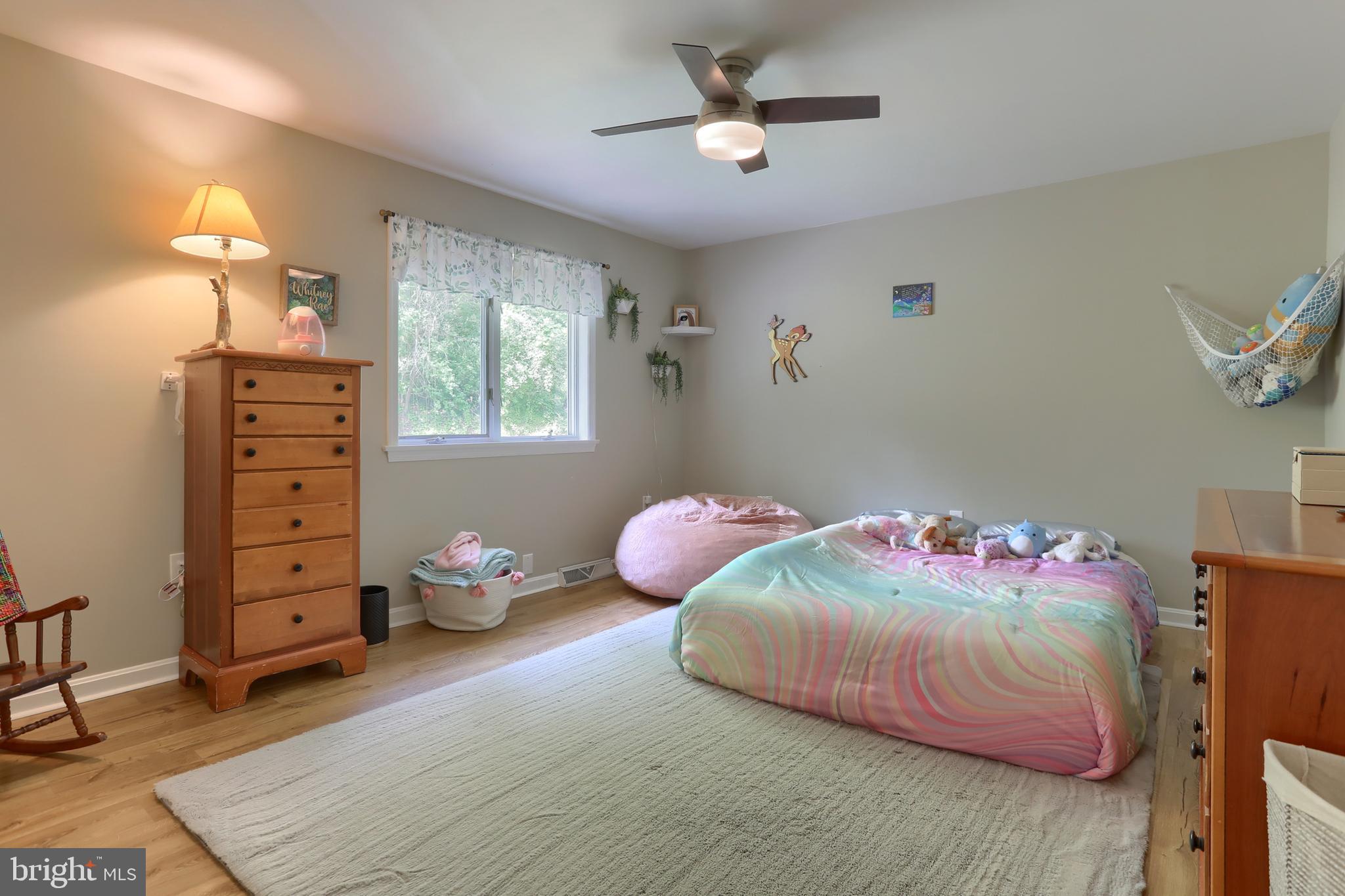 46 Gelsinger Road Reading, PA 19608 - Photo 30 of 50 a bedroom with a bed dresser and a window