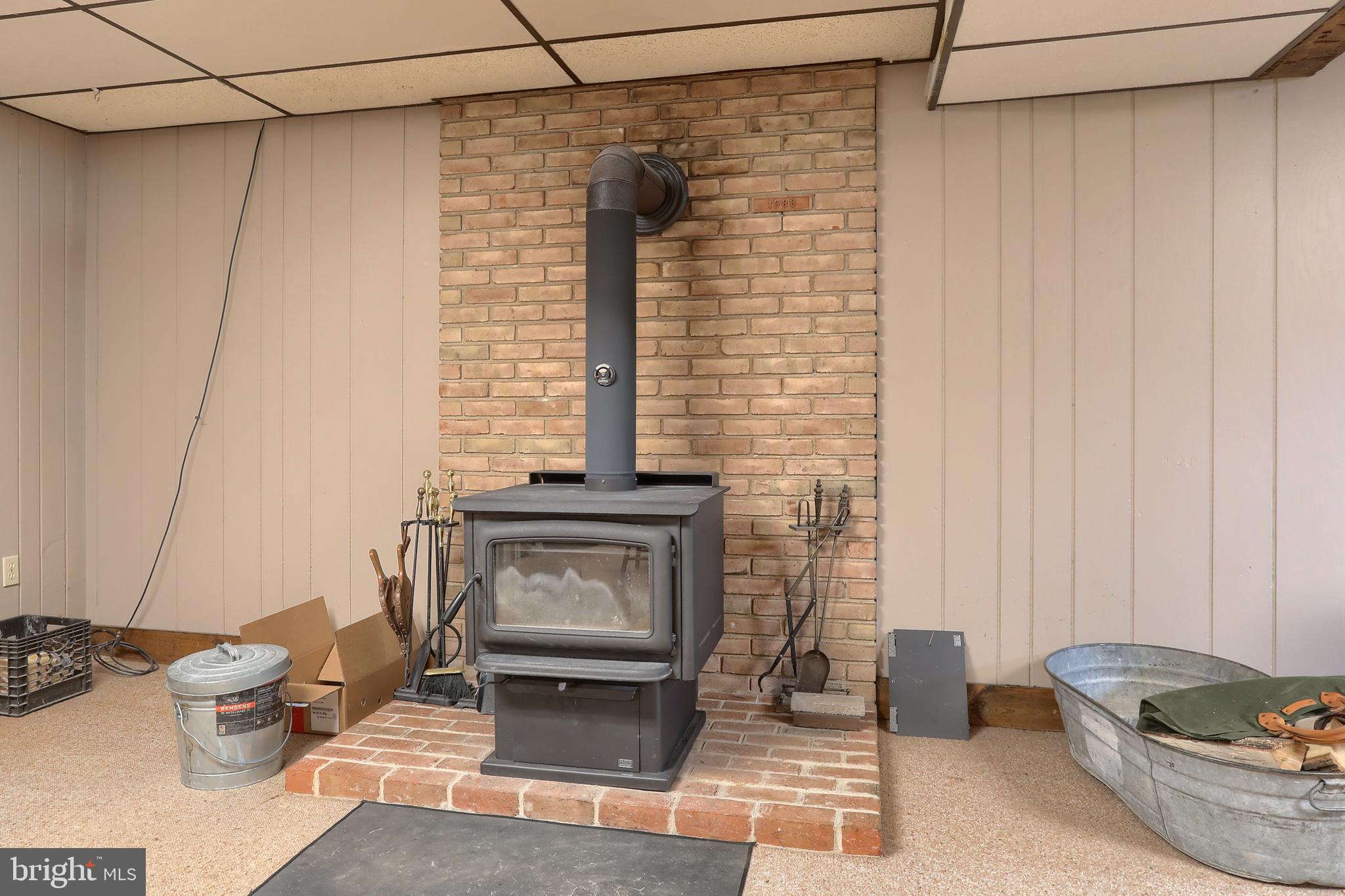 46 Gelsinger Road Reading, PA 19608 - Photo 38 of 50 a living room with furniture and a fireplace