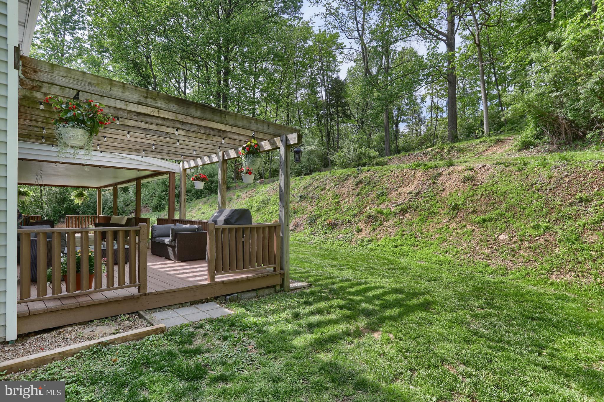 46 Gelsinger Road Reading, PA 19608 - Photo 40 of 50 a view of a backyard with a patio