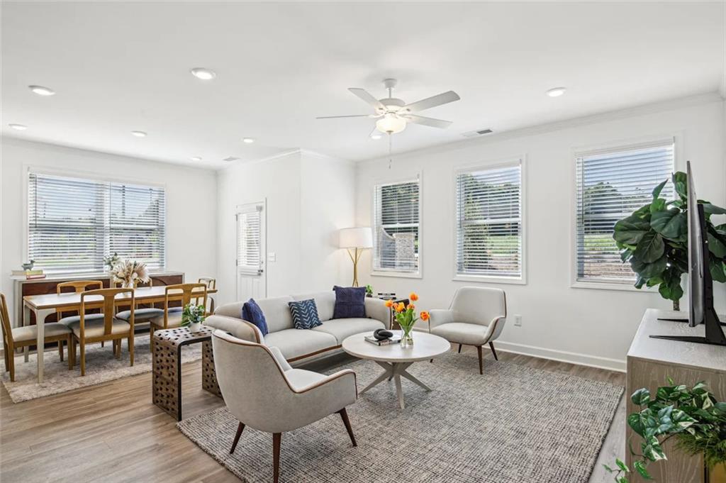 4021 Hillmont Lane Powder Springs, GA 30127 - Photo 6 of 11 a living room with furniture and wooden floor