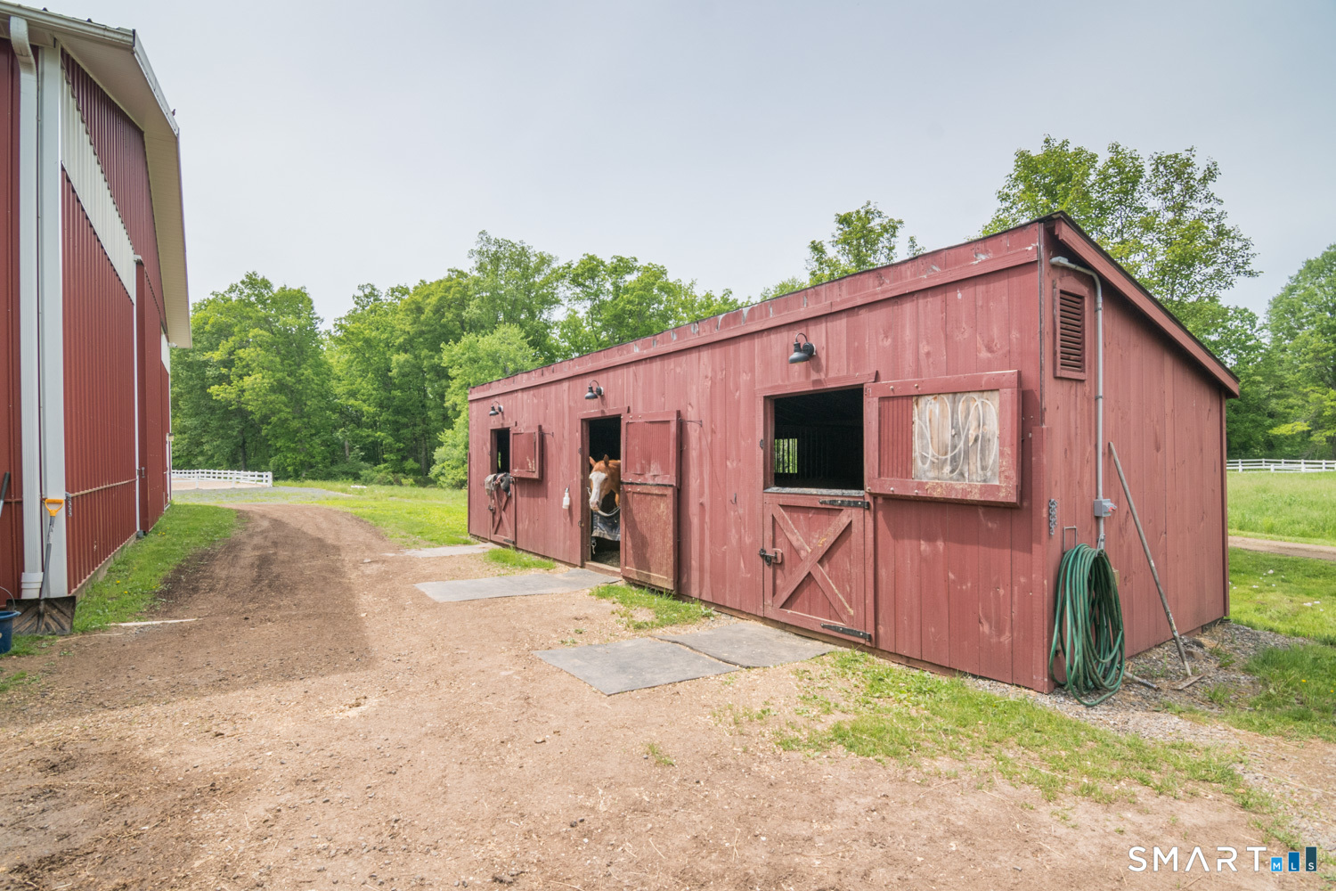 949 North Street Suffield, CT 06078 - Photo 20 of 33 a view of a house with backyard and plants