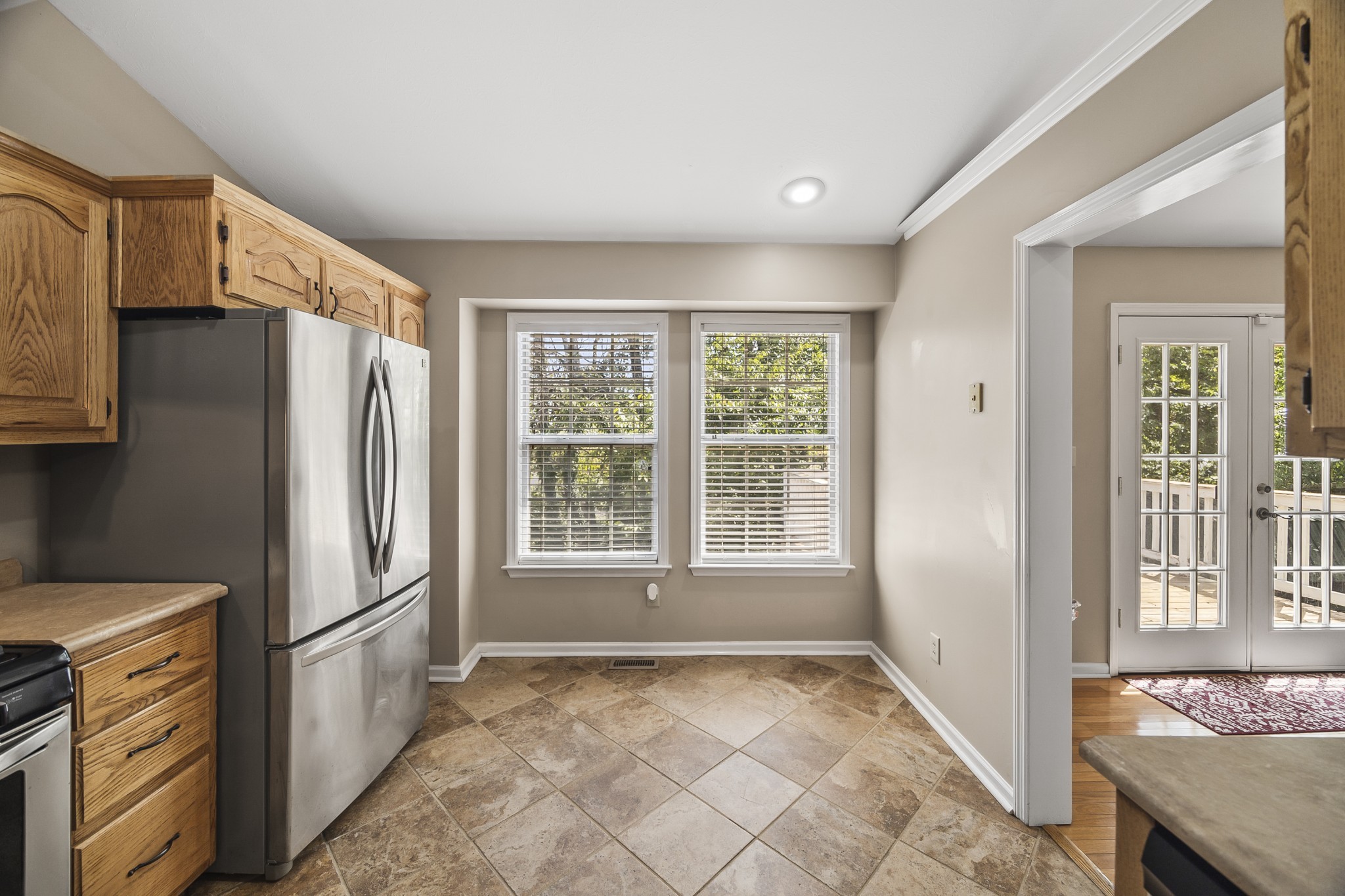 210 Winding Way Columbia, TN 38401 - Photo 11 of 28 a view of a kitchen with a sink dishwasher and a refrigerator
