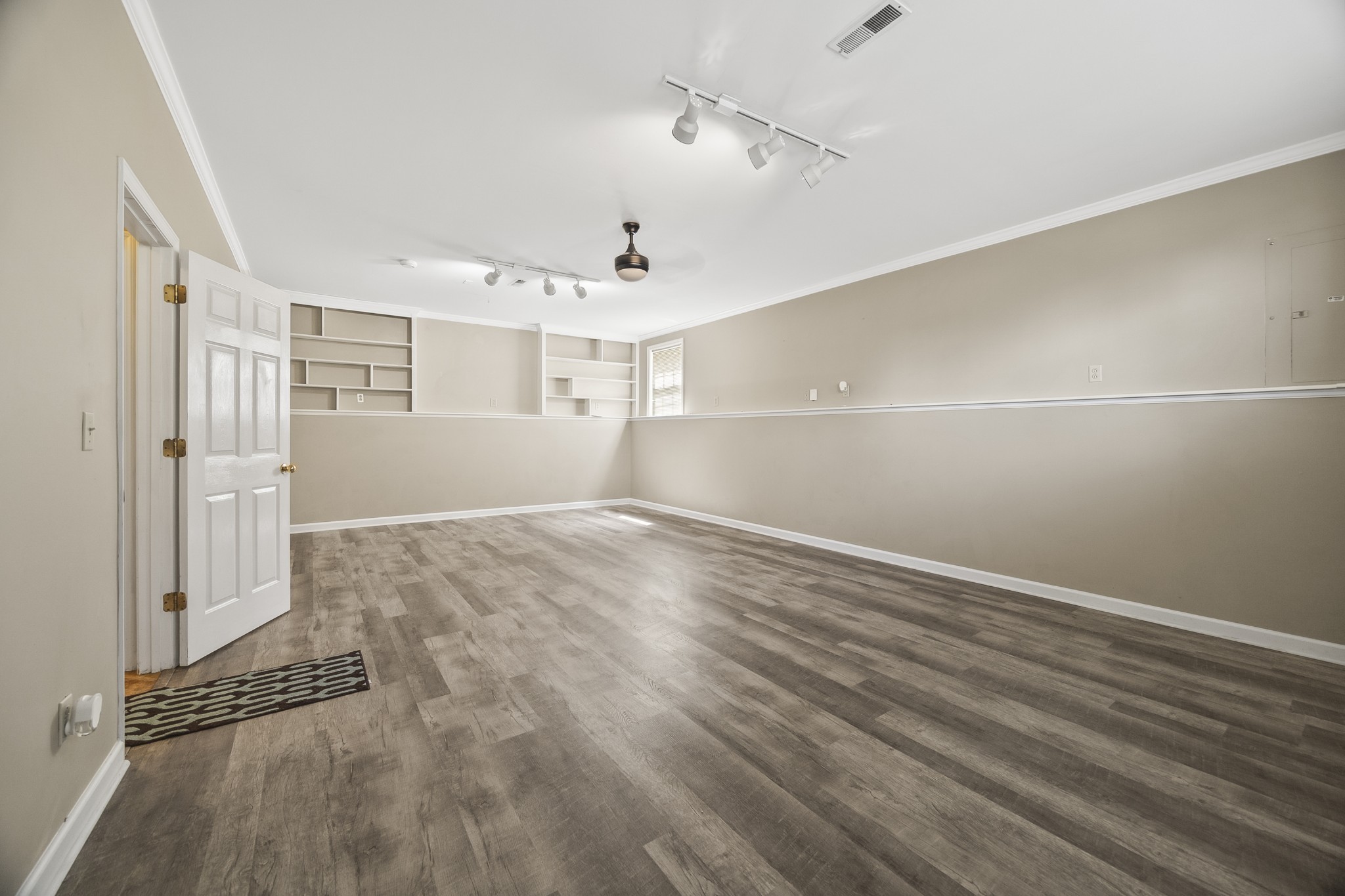 210 Winding Way Columbia, TN 38401 - Photo 14 of 28 a view of a room with wooden floor and white walls