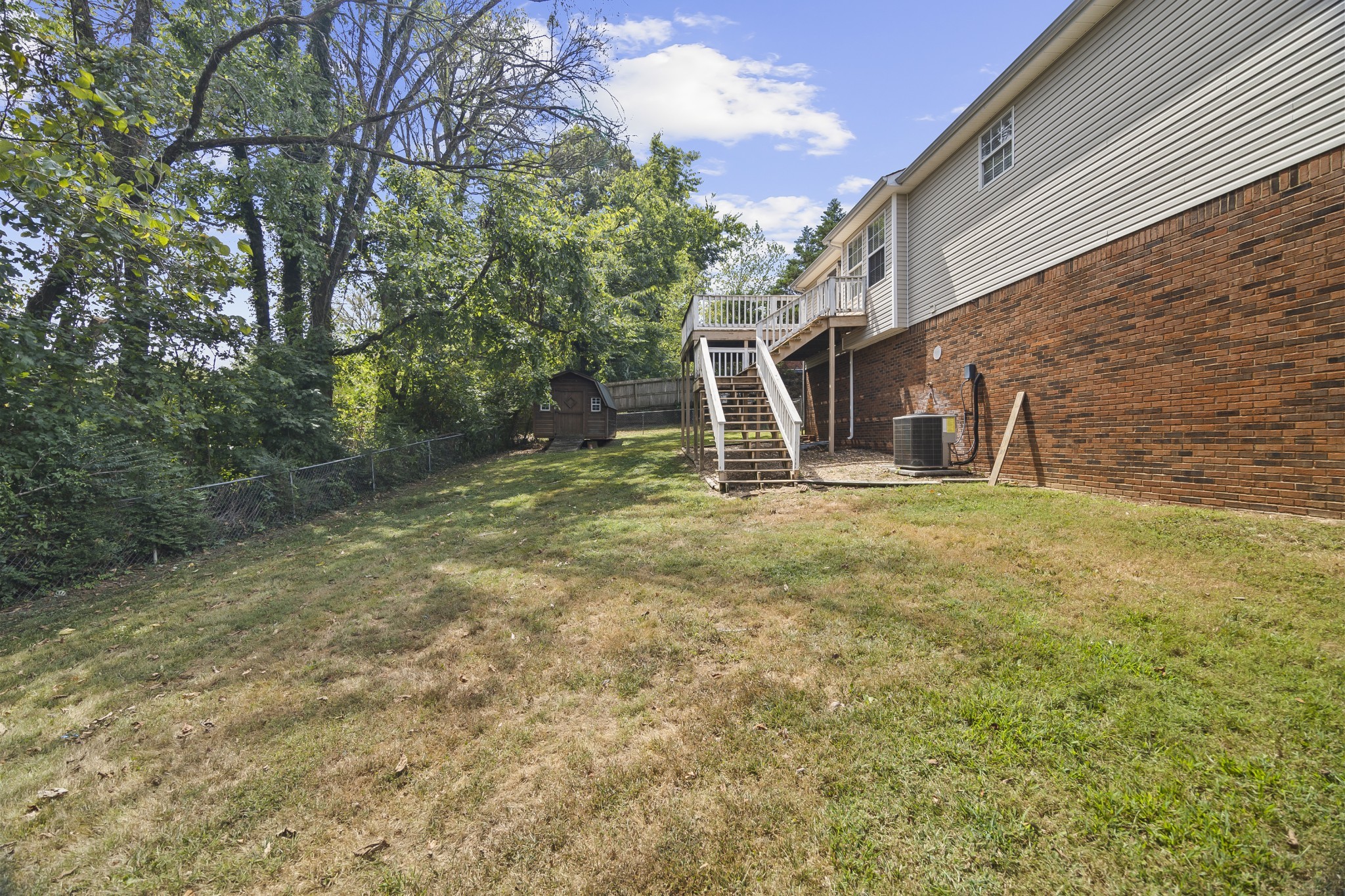 210 Winding Way Columbia, TN 38401 - Photo 18 of 28 a backyard of a house with lots of green space