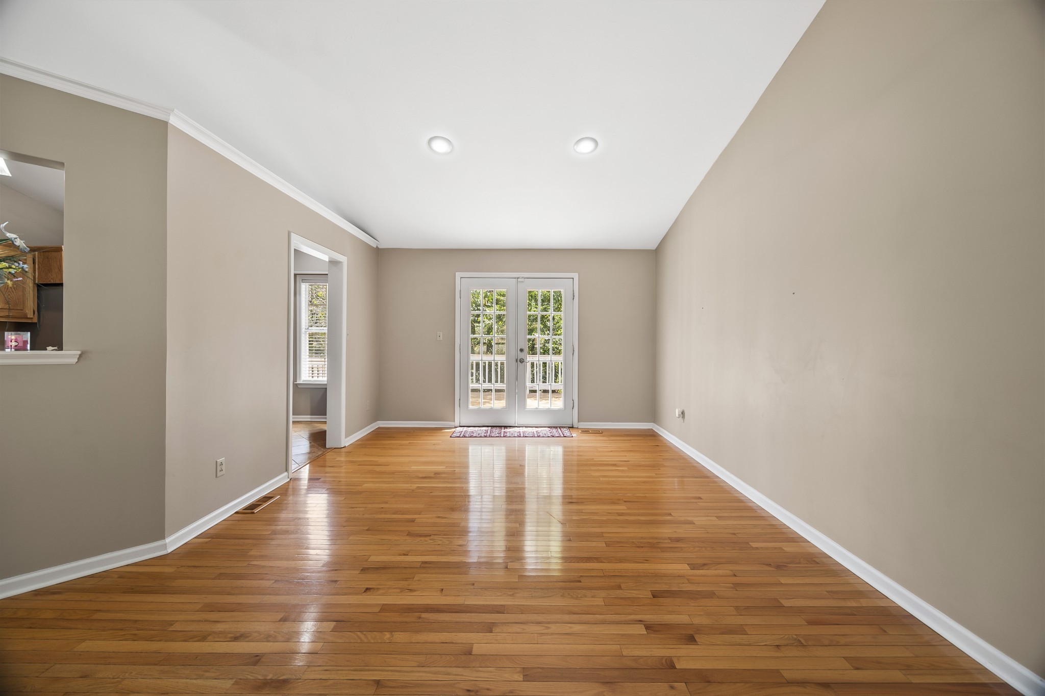 210 Winding Way Columbia, TN 38401 - Photo 5 of 28 a view of an empty room with window and wooden floor