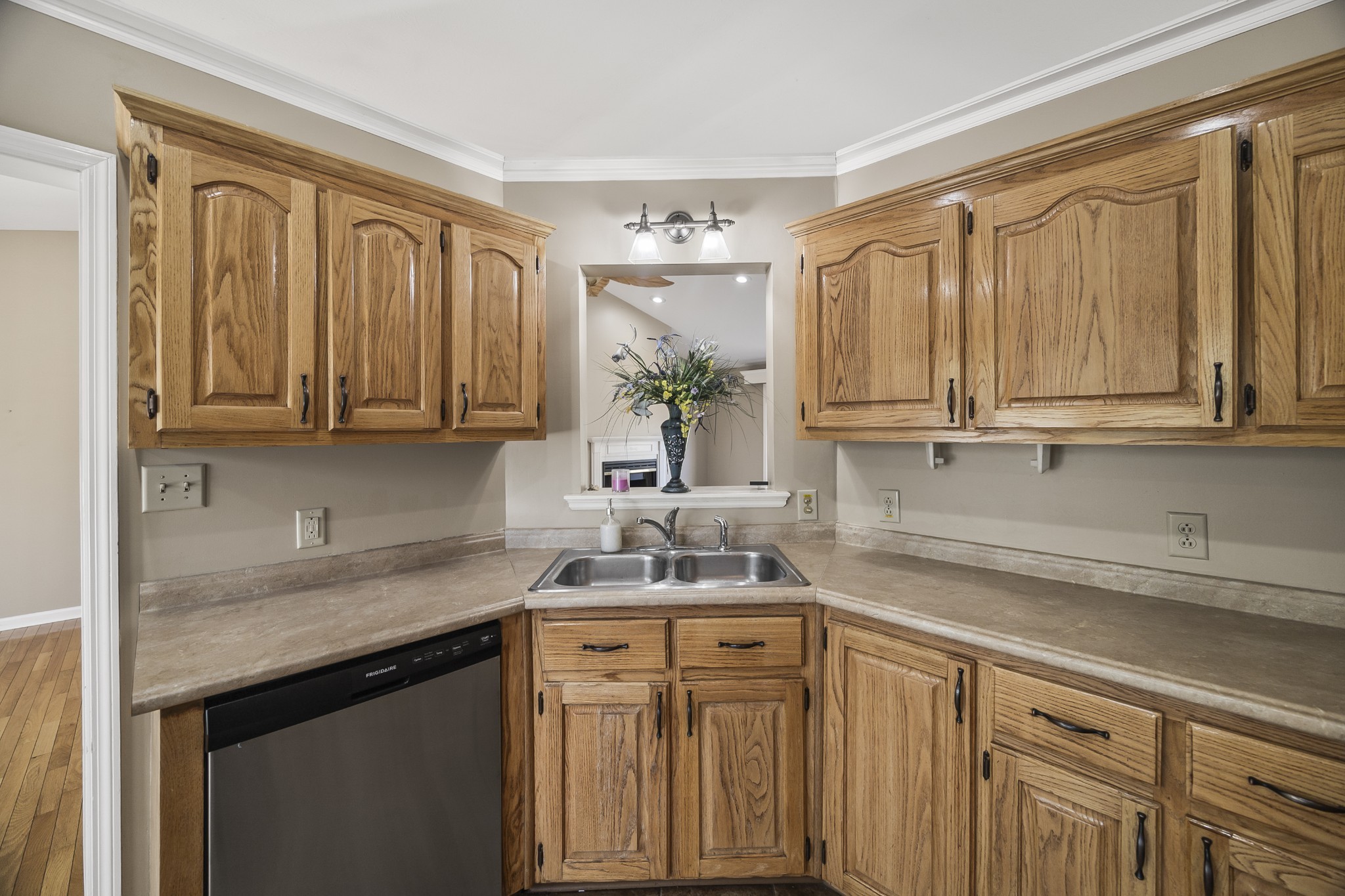 210 Winding Way Columbia, TN 38401 - Photo 10 of 28 a kitchen with stainless steel appliances granite countertop white cabinets a sink and dishwasher