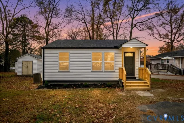 a house with trees in front of it