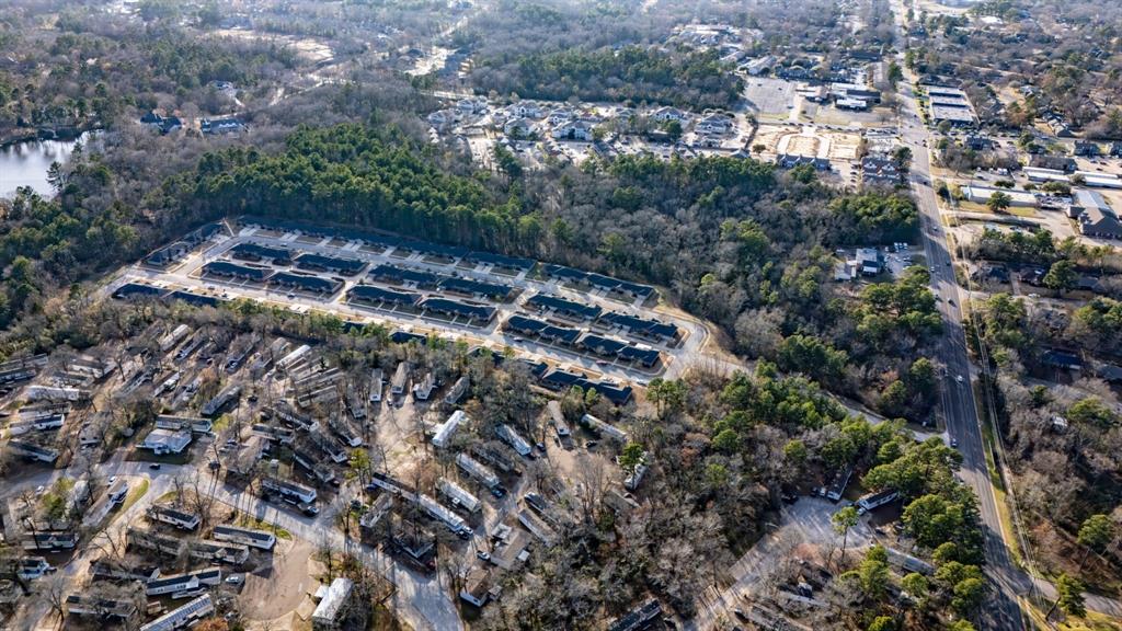 2043 Shiloh Road Tyler, TX 75703 - Photo 14 of 19 an aerial view of residential house with outdoor space and trees all around