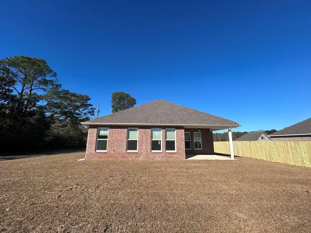 a front view of a house with a garage