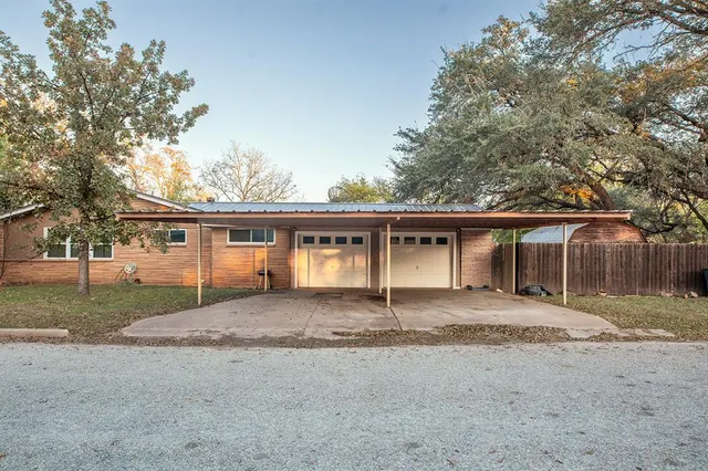 front view of a house with a patio