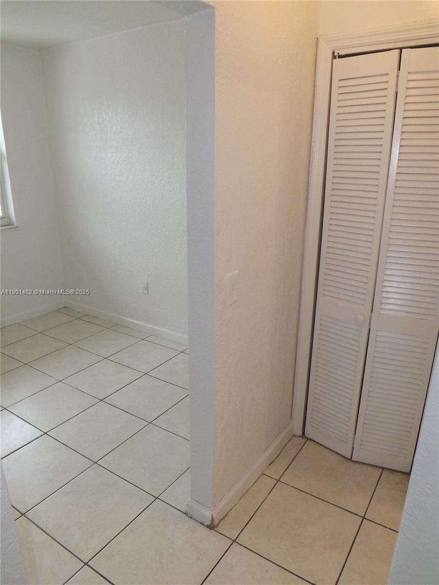 160 Northwest 11th Terrace, Unit 2 Miami, FL 33136 - Photo 6 of 9 a view of a hallway