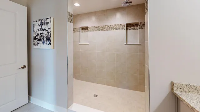 a bedroom with a bed and lamp