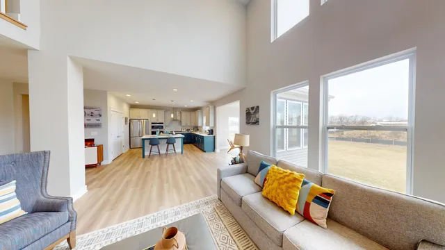 a living room with furniture and a table
