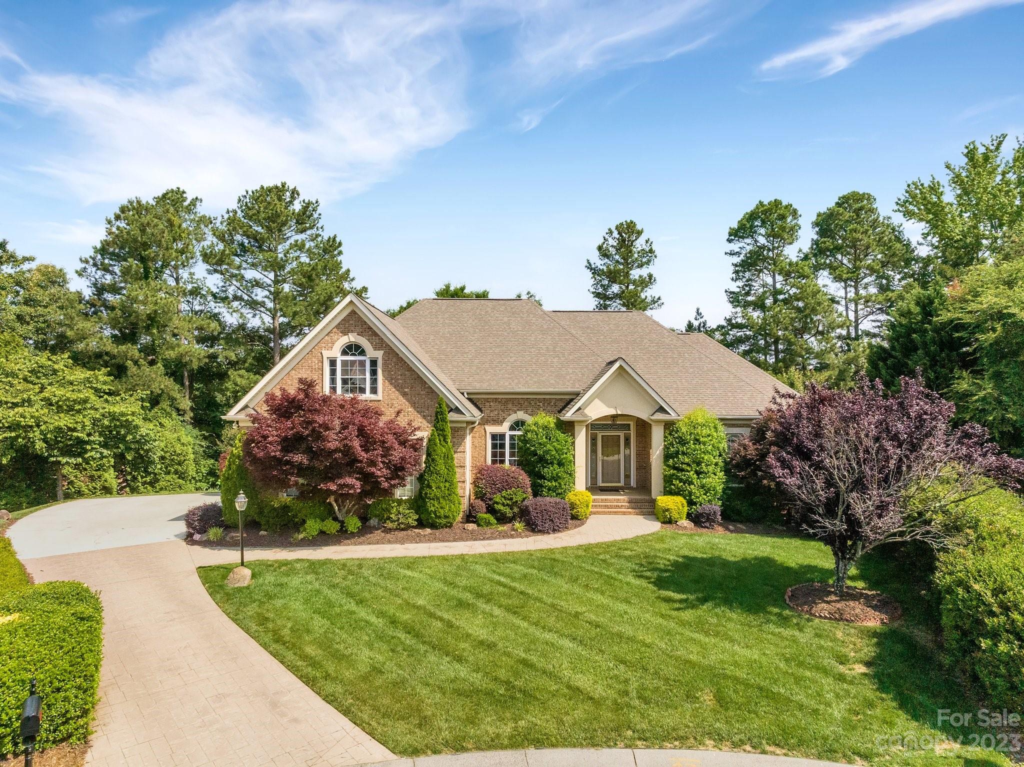 256 Hemingway Lane Fort Mill, SC 29708 - Photo 1 of 41 a front view of a house with garden