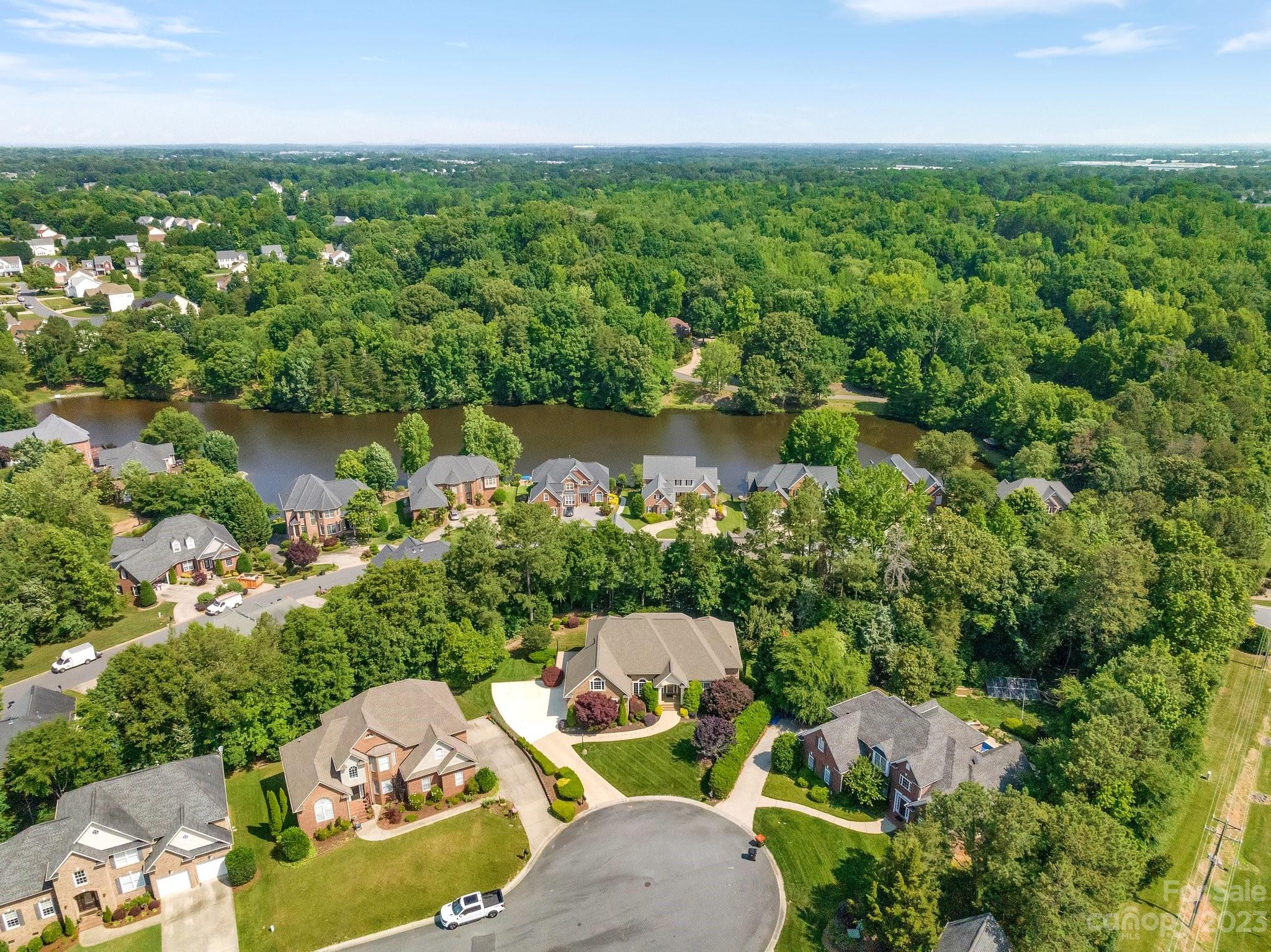 256 Hemingway Lane Fort Mill, SC 29708 - Photo 2 of 41 an aerial view of a house with a lake view
