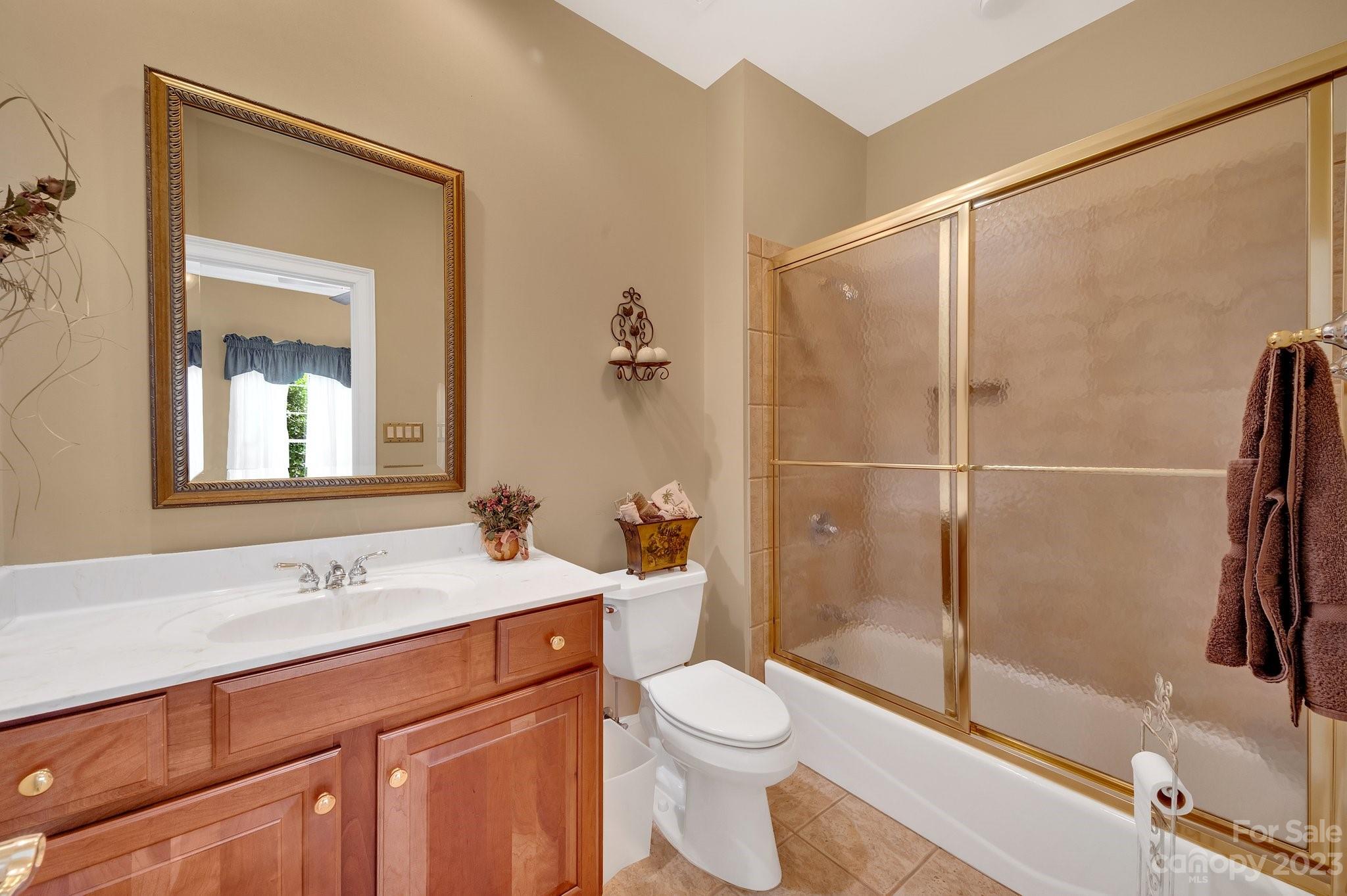256 Hemingway Lane Fort Mill, SC 29708 - Photo 26 of 41 a bathroom with a sink a toilet and shower
