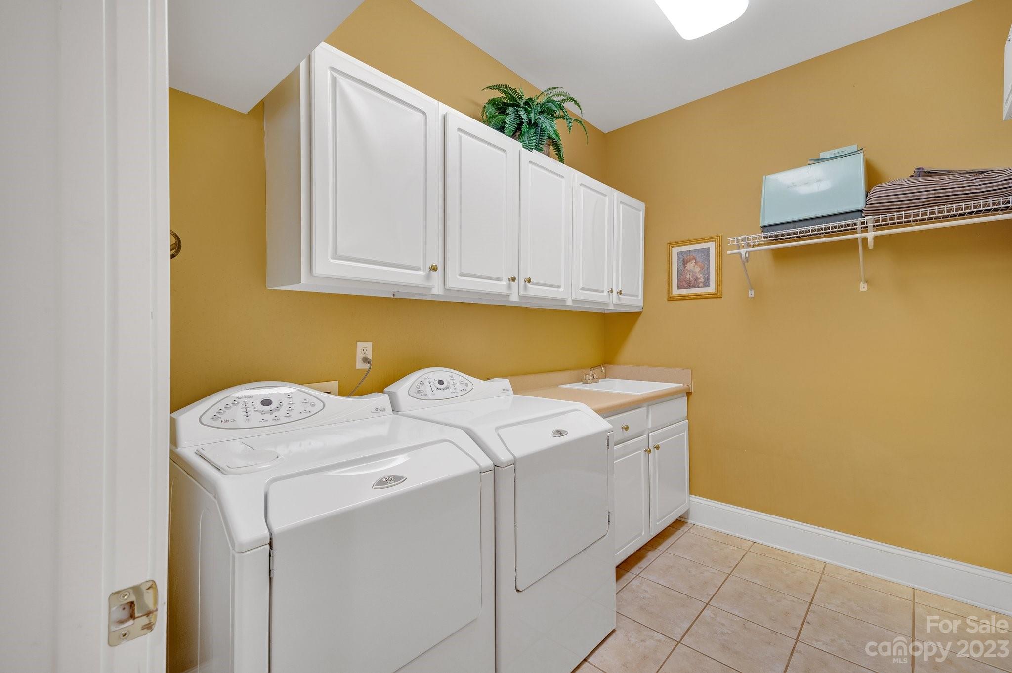 256 Hemingway Lane Fort Mill, SC 29708 - Photo 27 of 41 a utility room with dryer and washer