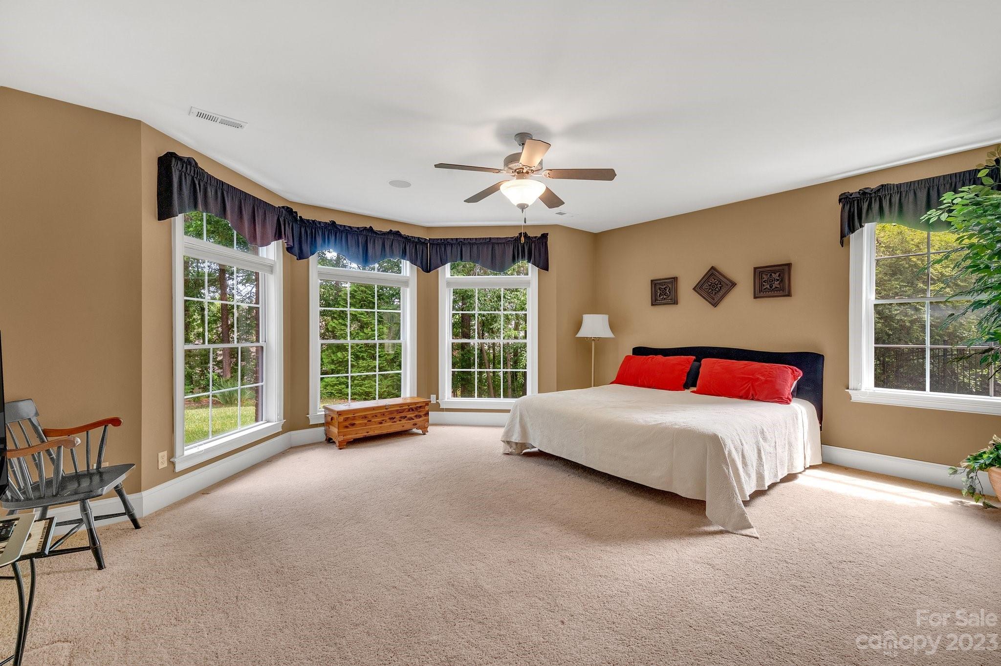256 Hemingway Lane Fort Mill, SC 29708 - Photo 29 of 41 a bedroom with a large bed and a large window