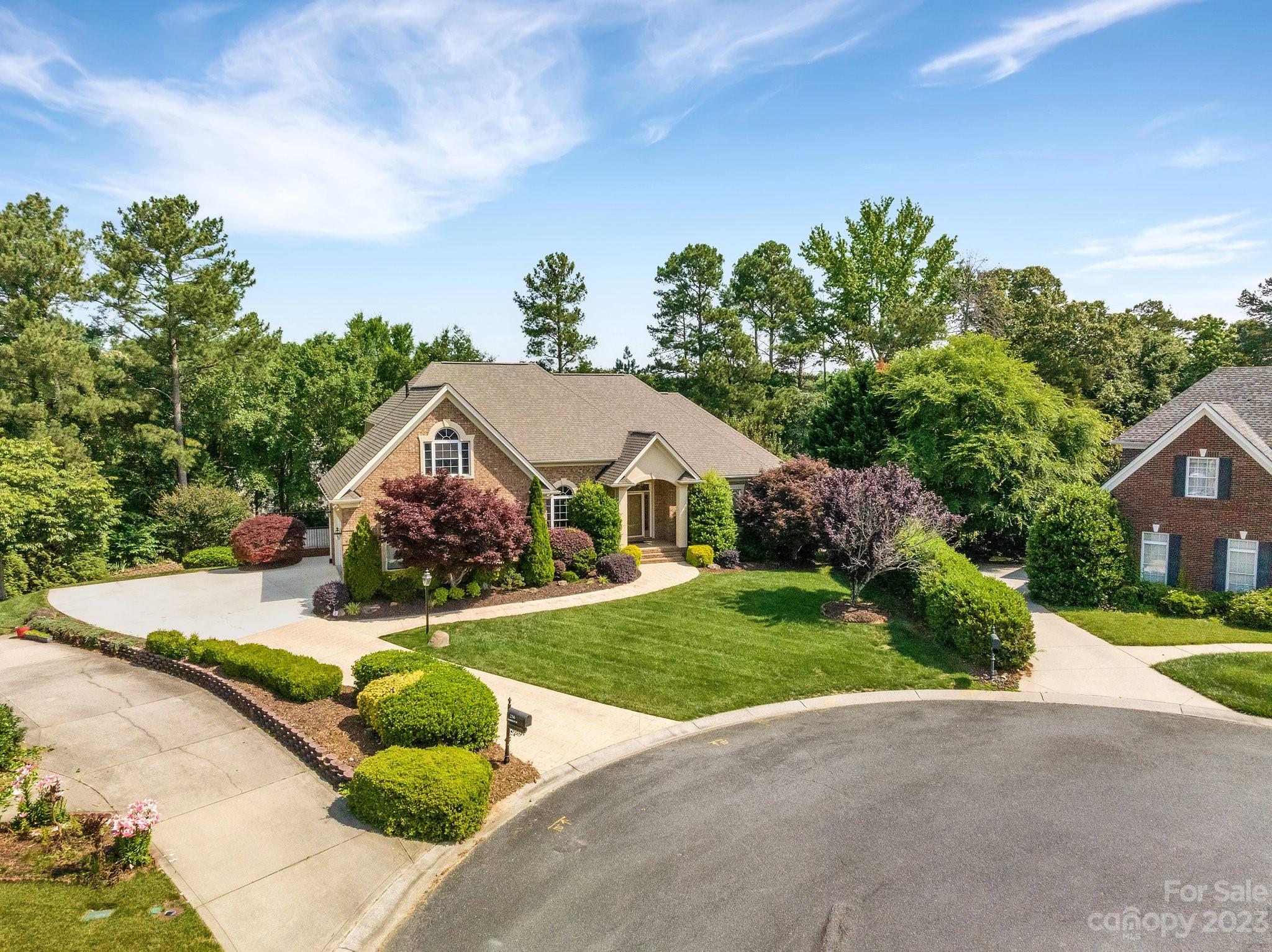 256 Hemingway Lane Fort Mill, SC 29708 - Photo 3 of 41 a front view of a house with a yard and garage