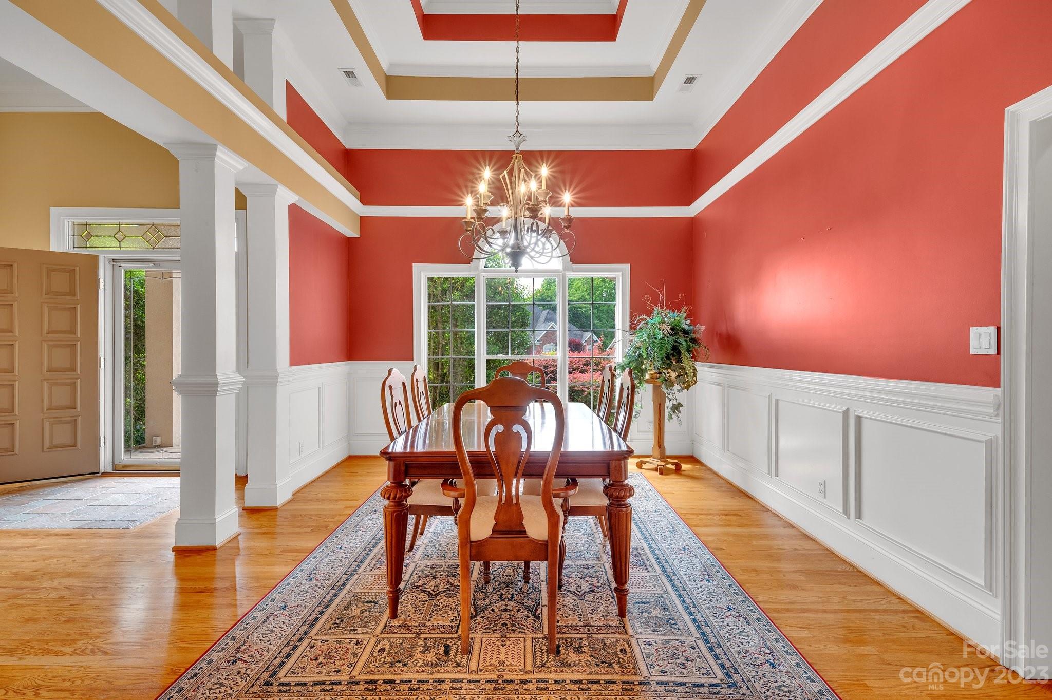 256 Hemingway Lane Fort Mill, SC 29708 - Photo 8 of 41 a dining room with furniture a rug and wooden floor