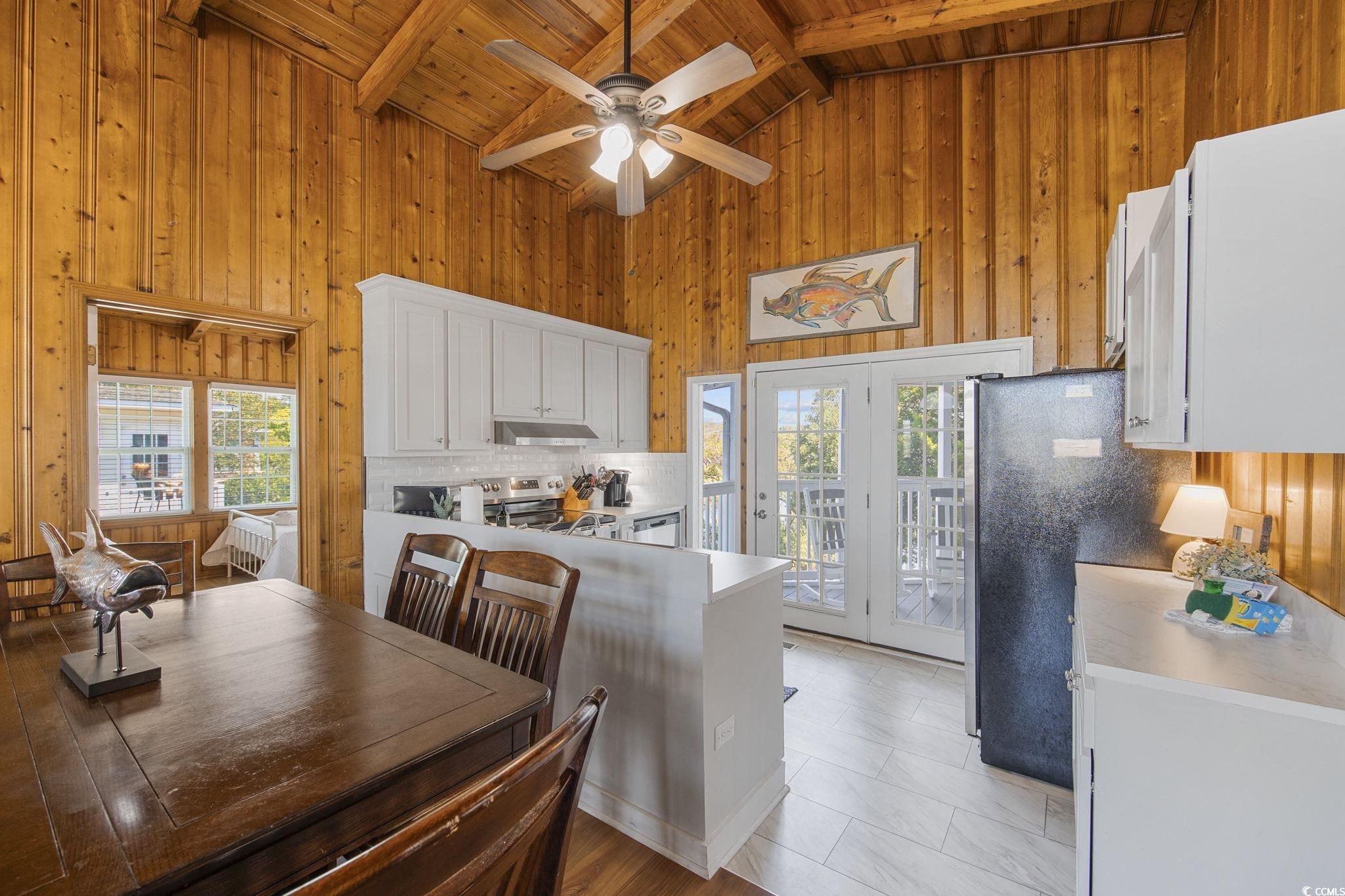 222 Calhoun Drive Murrells Inlet, SC 29576 - Photo 7 of 40 Kitchen featuring beam ceiling, appliances with st