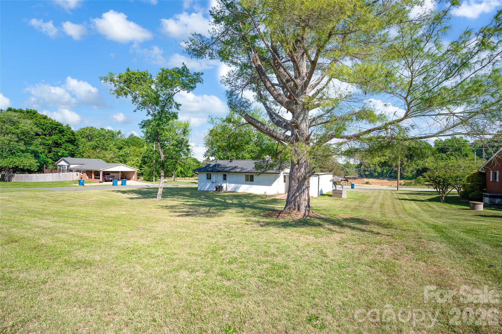 3033 West Highway 10 Conover, NC 28613 - Photo 8 of 26 a swimming pool with wooden fence