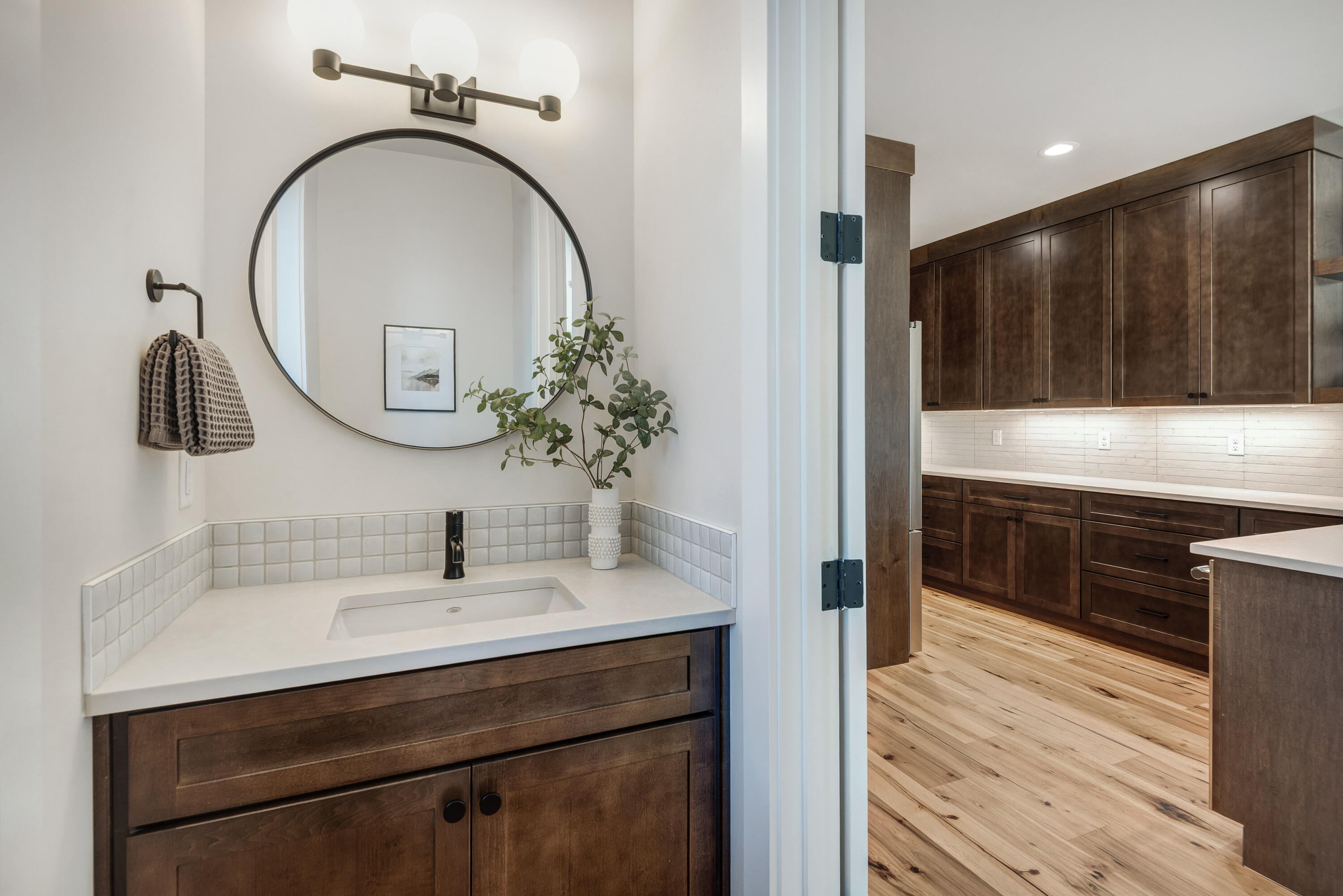 334 Southwest Roosevelt Avenue, Unit 4 Bend, OR 97702 - Photo 12 of 22 a bathroom with a sink and a mirror