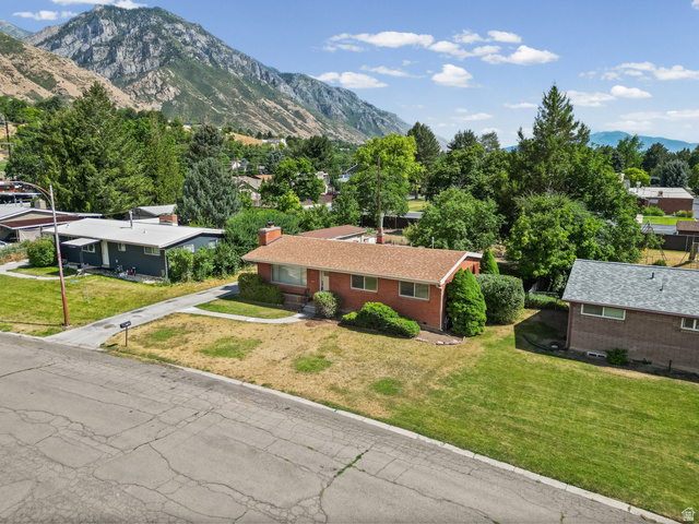 542 East 3400th Street North Provo, UT 84604 - Photo 31 of 39 Brick exterior featuring a gabled roofline