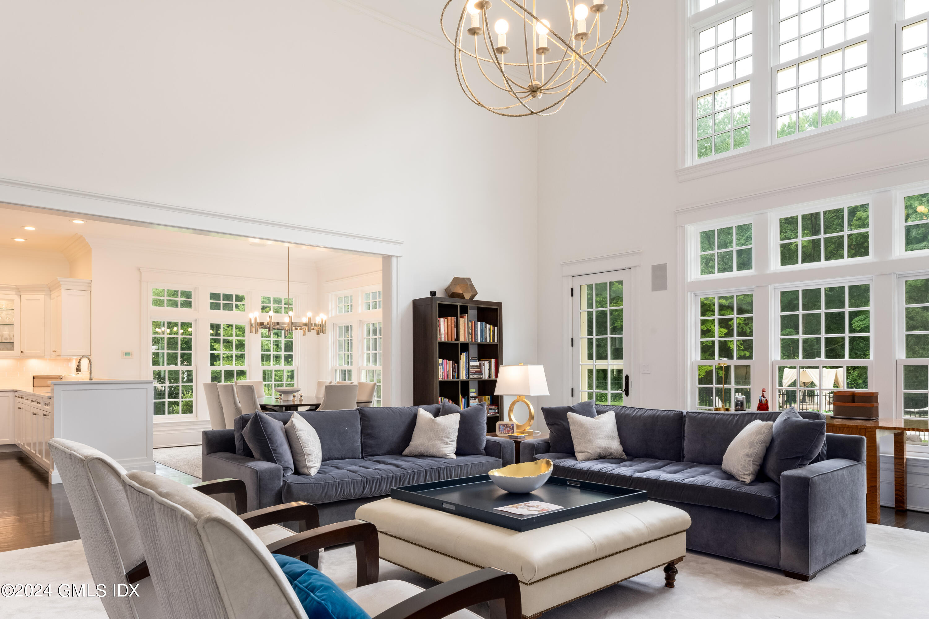 28 Thunder Mountain Road Greenwich, CT 06831 - Photo 11 of 32 a living room with furniture and a large window