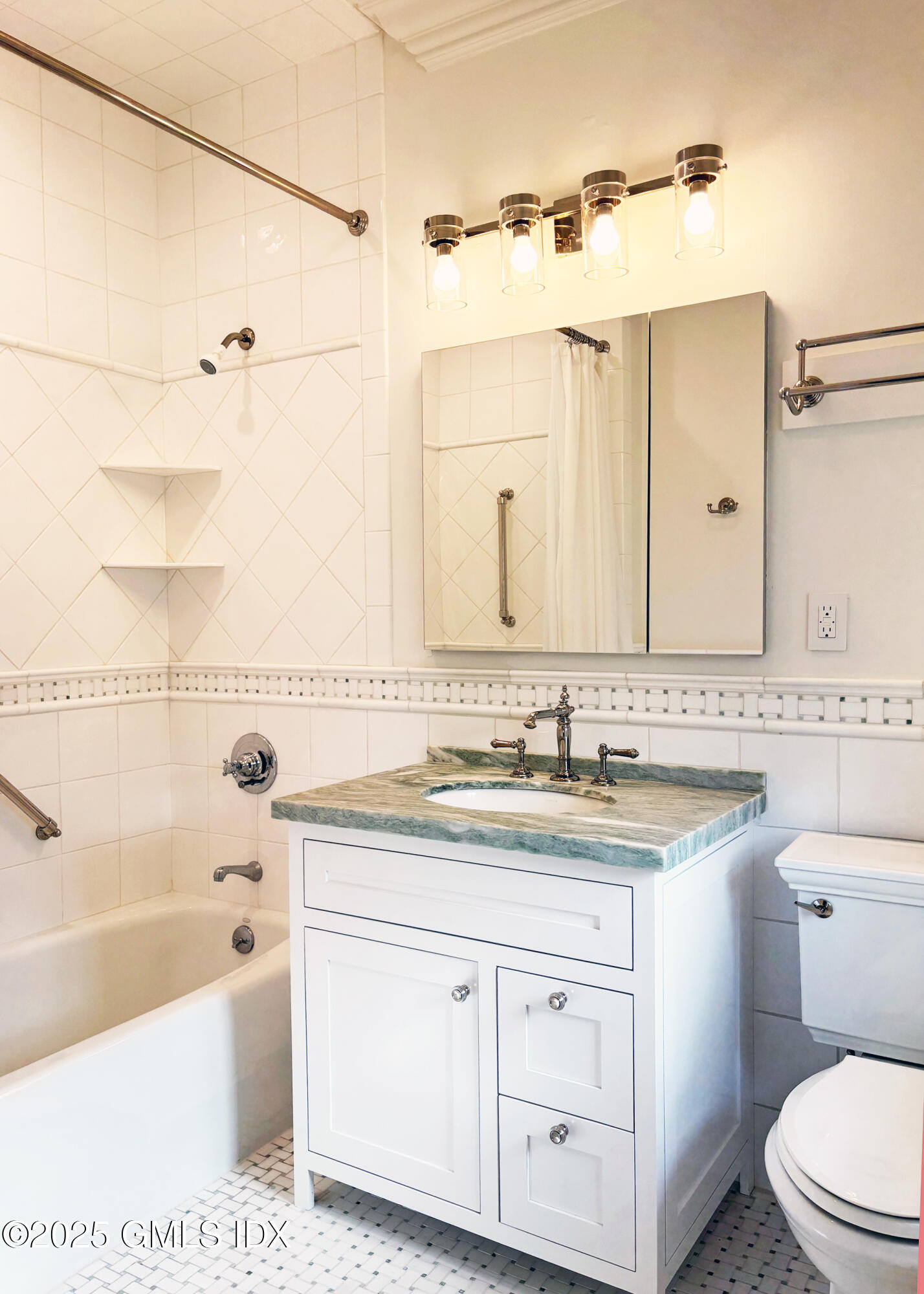 28 Thunder Mountain Road Greenwich, CT 06831 - Photo 22 of 32 a bathroom with a sink a toilet and bathtub